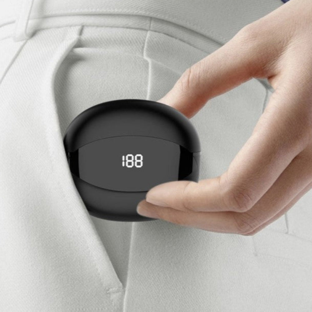 lady putting tri tek pro earbuds into her pocket