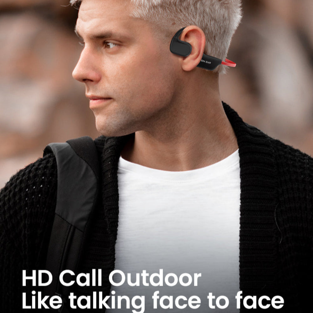 Person wearing air conduction headphones 